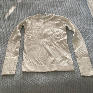 Lululemon exercise pullover. Color ivory size 4 lightly worn